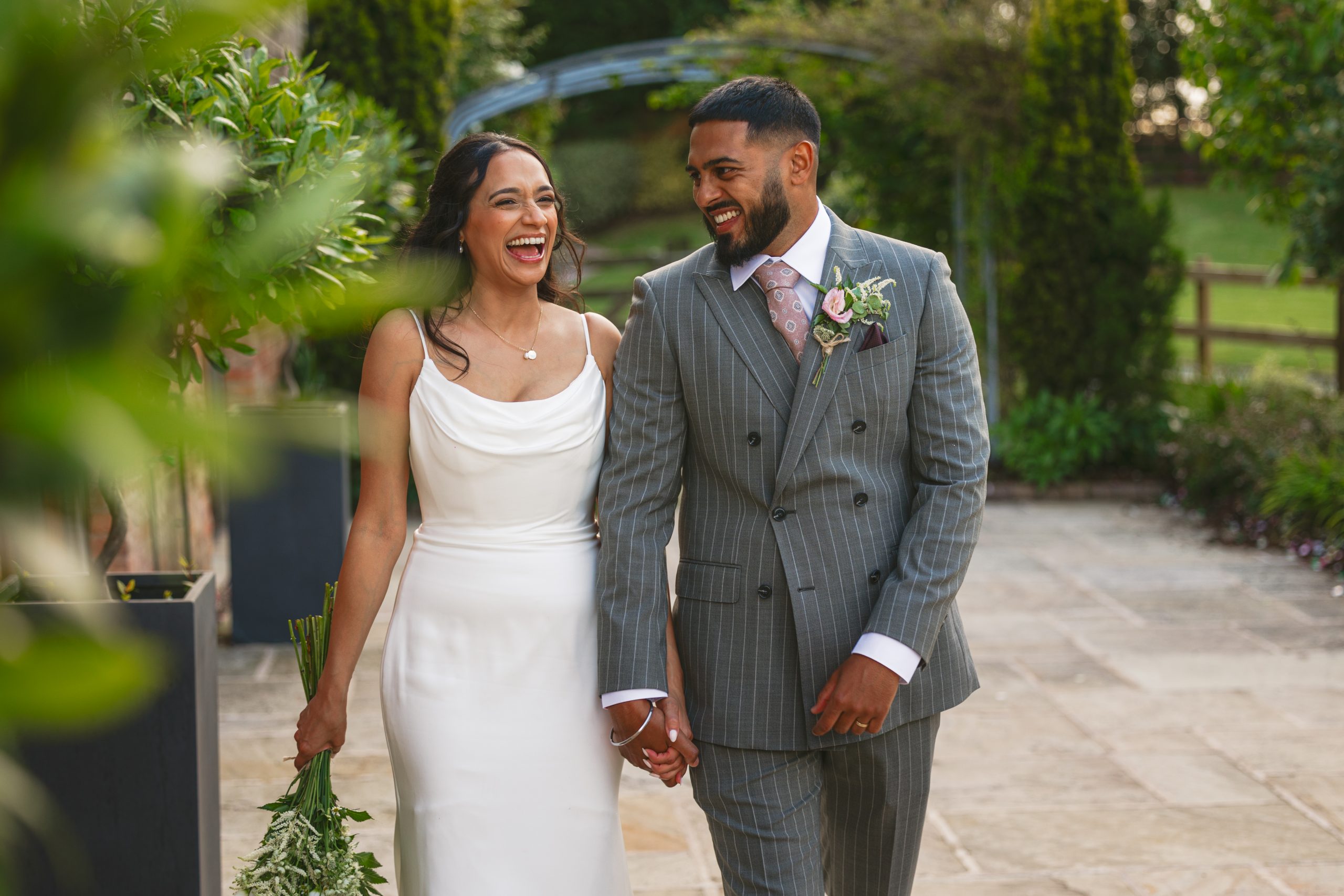 Bride and groom portraits at Mythe Barn