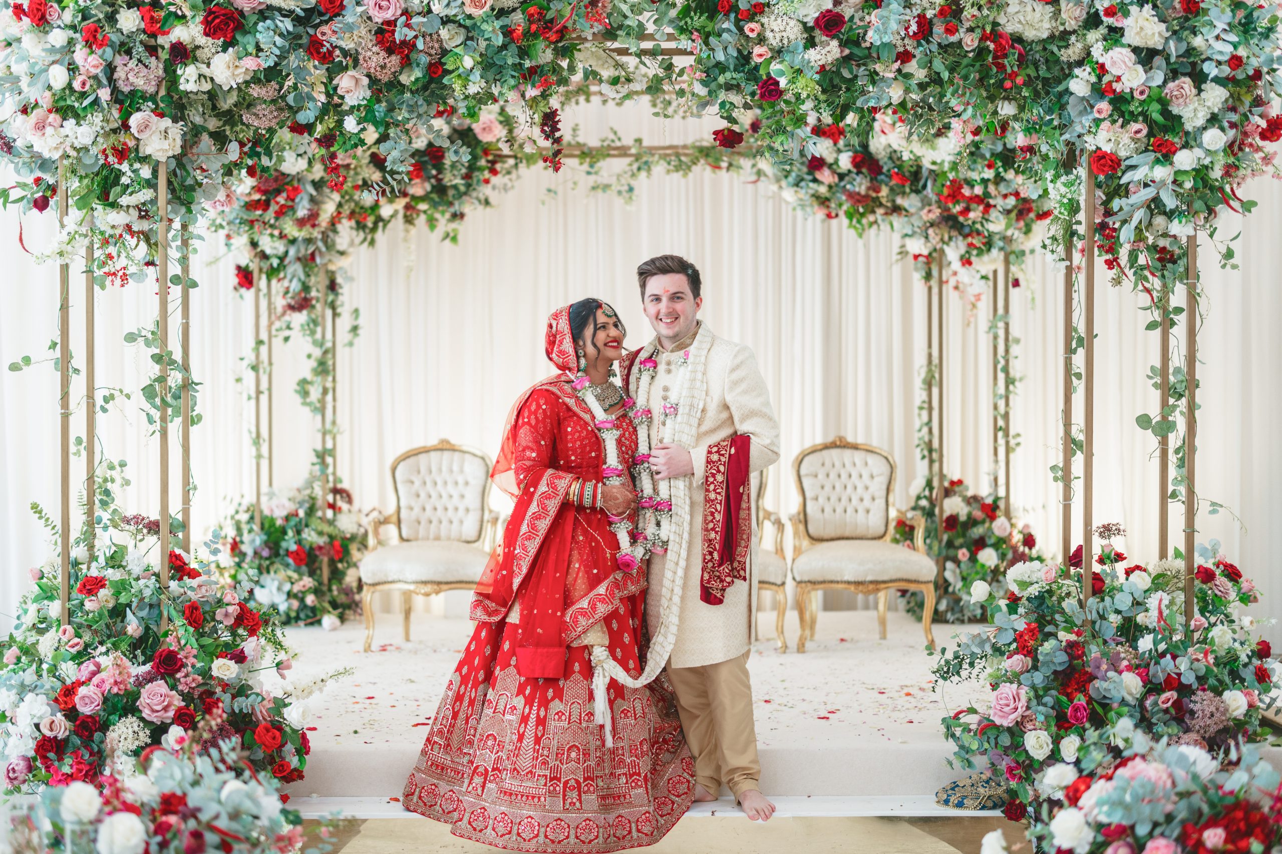 Bride and groom together in the mandap during their Hindu wedding ceremony