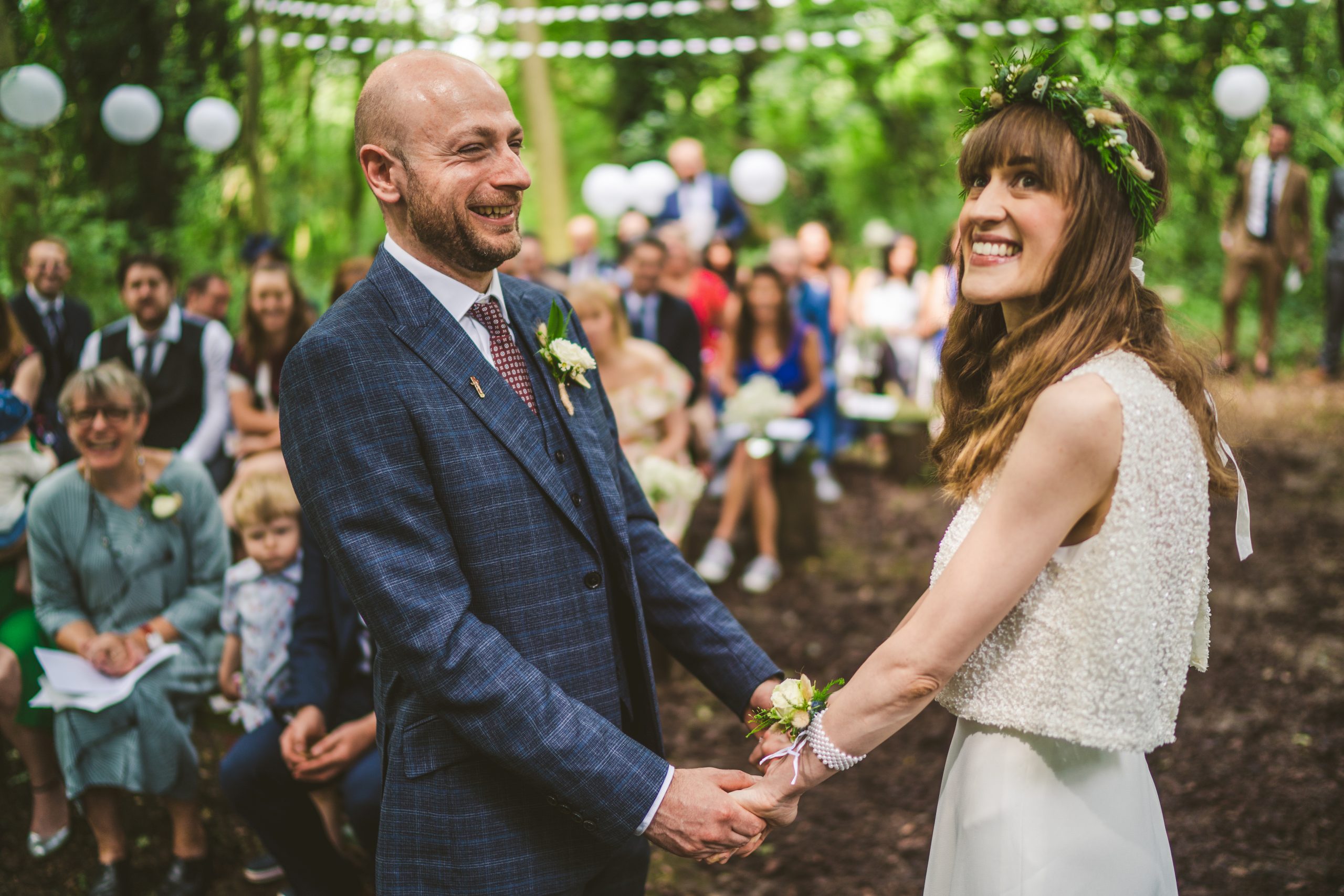 Outdoor wedding couple reactions during a ceremony in Leicestershire